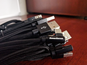 USB power cords with PowerGistics logo on them.