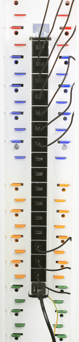 Image contains a USB PDU with USB cables hooked into it. The back of a PowerGistics charging Tower for laptops, Chromebooks and laptops.