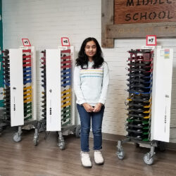 PowerGistics Core16 charging stations with girl standing in front