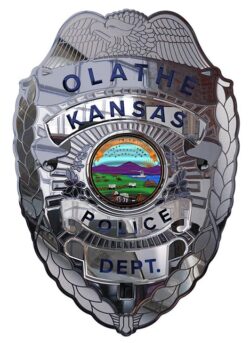 Image shows Olathe Kansas police dept badge