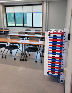 PowerGistics charging station mounted to wall in classroom