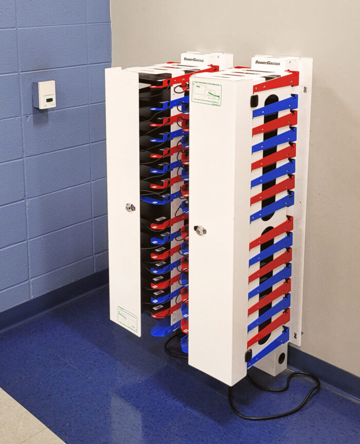 PowerGistics charging stations with blue and red shelves in classroom