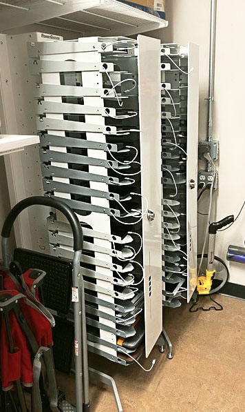 PowerGistics Grab & Go20 charging stations in a closet on a stand