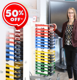 Image contains IT director in library by PowerGistics Core16 charging stations. Text contains 50% Off