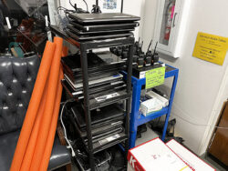 Image shows devices stored on plastic cart