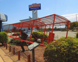 Image shows front of Hiller Aviation Museum building