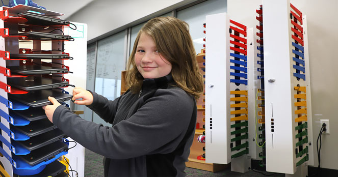 girl by PowerGistics charging stations