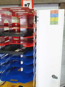 Image shows PowerGistics charging station flat shelves and open door